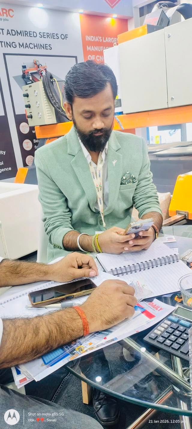 Prasad Salapurikar at a CNC machinery exhibition booth