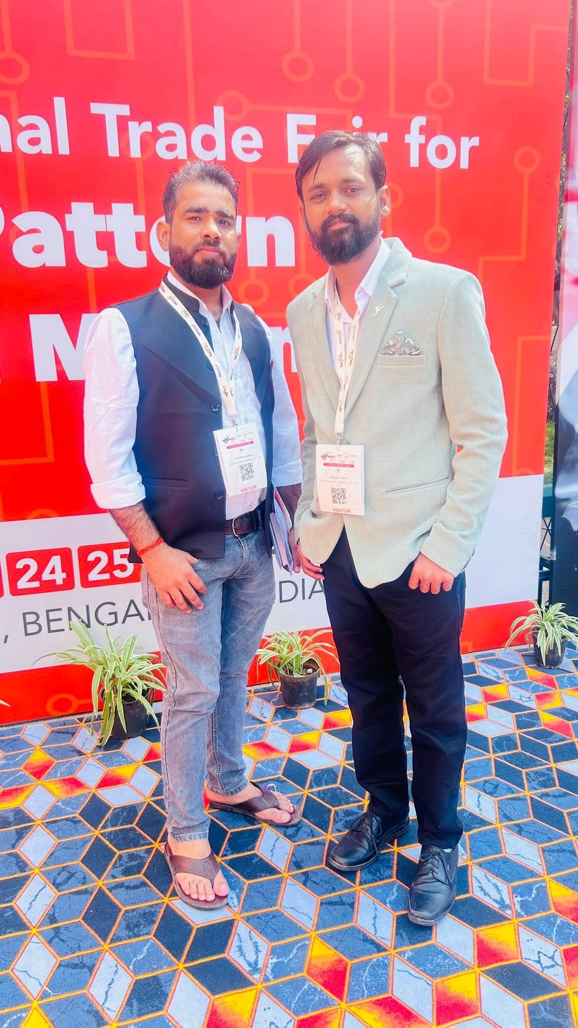 Prasad Joshi and colleague at an international manufacturing trade fair in Bengaluru